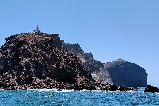 Private Full-Day Motor Yacht Cruise with Meal, Open Bar+Transfers - Thirasia snorkeling and time on the water