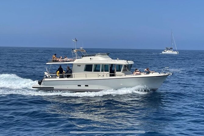 Private Full-Day Motor Yacht Cruise with Meal, Open Bar+Transfers - Red Beach and White Beach: Santorini’s unusual shoreline