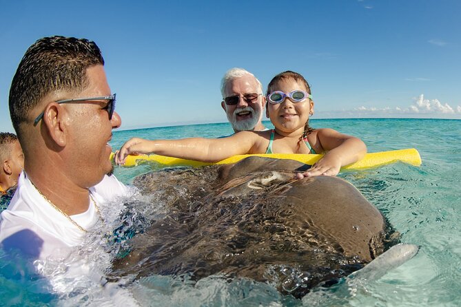 Private Yacht 48 ft Sting Ray City, Snorkel & Starfish Beach - Snorkeling over coral in 8 to 10 feet of water