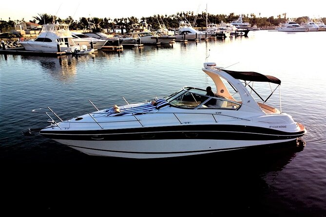 Private yacht charter for cruising & snorkeling in Cabo San Lucas - Paddle board, floating mat, and onboard food