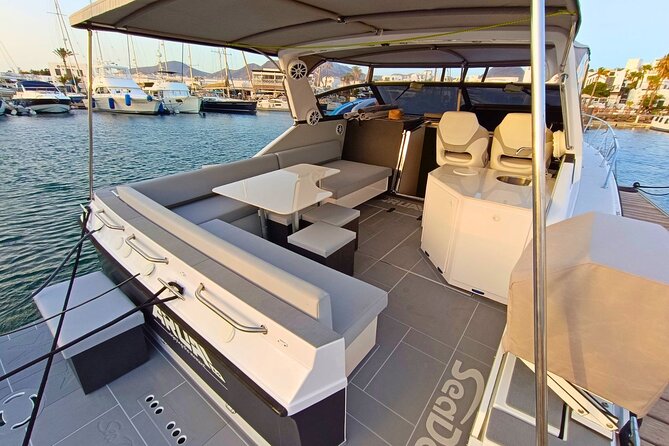 Private yacht in Papagayo Beaches with Gourmet or Premium menu - Red Cliffs and a Quiet Dark-Sand Cove