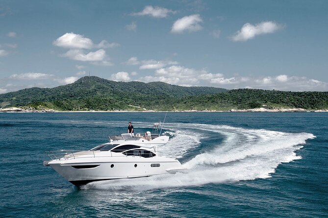Santorini Caldera: Private Flybridge Yacht Experience - White Beach is the quick photo stop