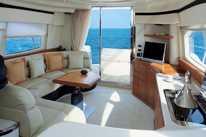 Santorini Caldera: Private Flybridge Yacht Experience - Thirassia combines swimming with a Greek meal