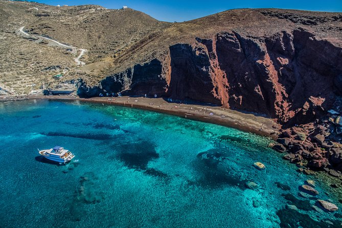 Santorini: Motor Yacht Day Cruise with 5-Course Lunch - Entering the caldera between two volcanoes