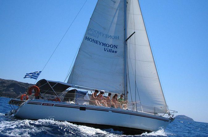 Santorini Oia: Private Sailing Yacht Cruise with Meal and Drinks - Drinks, snorkeling gear, and onboard comfort