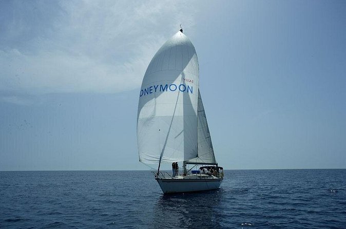 Santorini Oia: Private Sailing Yacht Cruise with Meal and Drinks - The crew and the private format