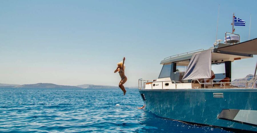Santorini: Private Diamond 36 Motor Yacht Caldera Cruise - Sunset from the Aegean