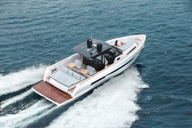 Santorini Private Luxury Yacht Sunset Cruise - Indian Rock and the Venetian Lighthouse