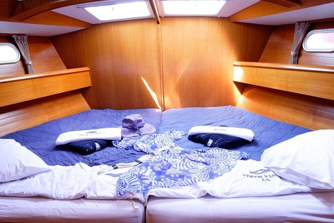 Santorini: Private Sailing Yacht Cruise with Meal and Drinks - Food and drinks: useful value, with one detail to confirm