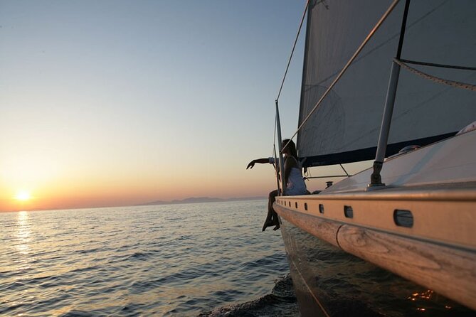 Santorini: Private Sailing Yacht Cruise with Meal and Drinks - Red Beach: Santorini’s most dramatic first view