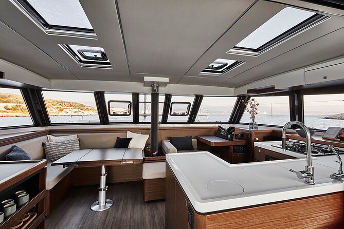 Santorini Private Tour Half-Day Sailing Platinum Catamaran Cruise - White Beach and Mesa Pigadia for quieter swimming