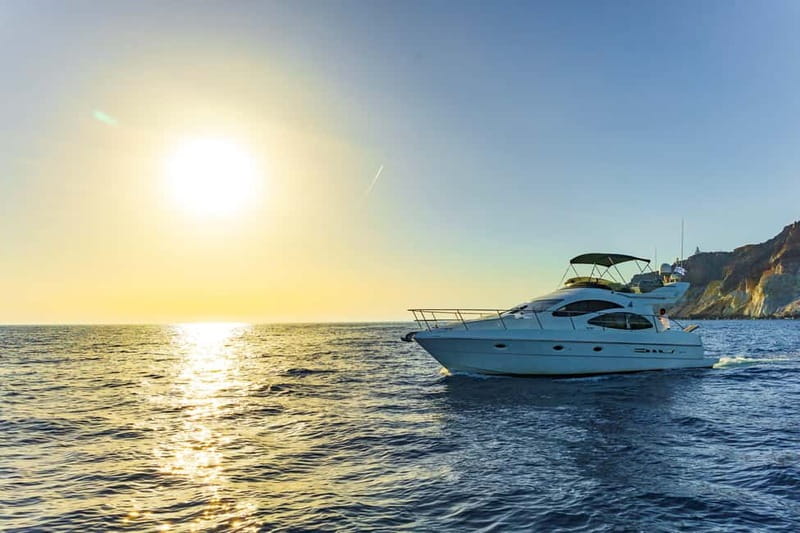 Santorini: Private Yacht Experience of Timeless Elegance - Drinks, snacks, and the sunset finish