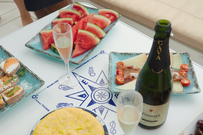 Shared Luxury Yacht Cruise with Champagne and Tapas - Pickup, language, and practical details