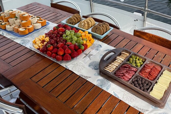 Shared Yacht Tour in Dubai Marina - Swimming, snacks, music, and the social side