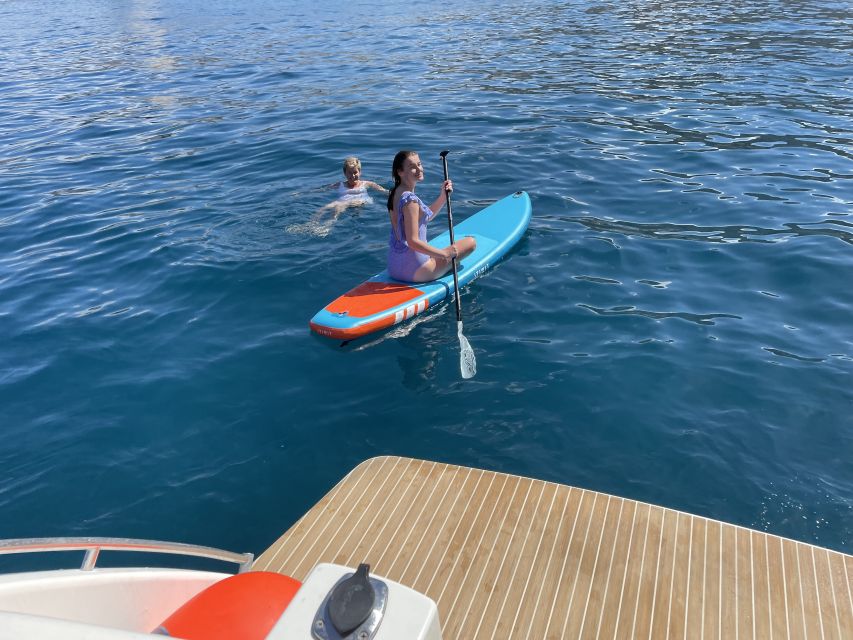 Tenerife: Whales and Snorkeling Tour on a Luxury Yacht - Swimming and snorkeling in a secluded bay
