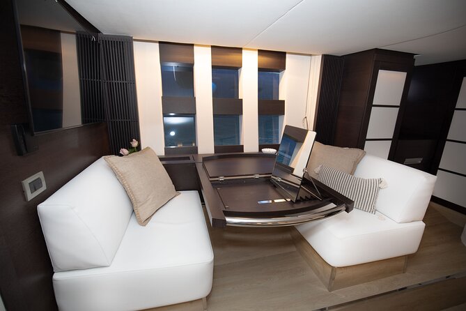 VIP Capri Yacht Experience Private Cruise Swim and Sunbathe - Circling Capri’s cliffs and hillside homes